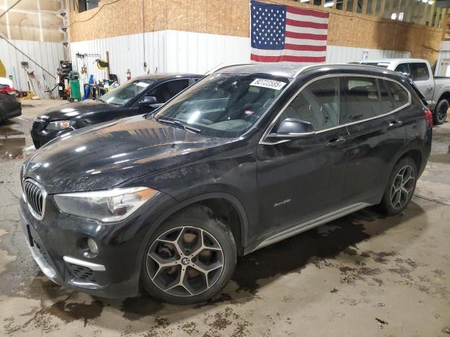 2017 BMW X1 VIN WBXHT3C35H5F87284 COPART salvage auction — REAR END, Ak - Bill Of Sale- Salvage, sold $35 on 2026-07-28 (photo 1)
