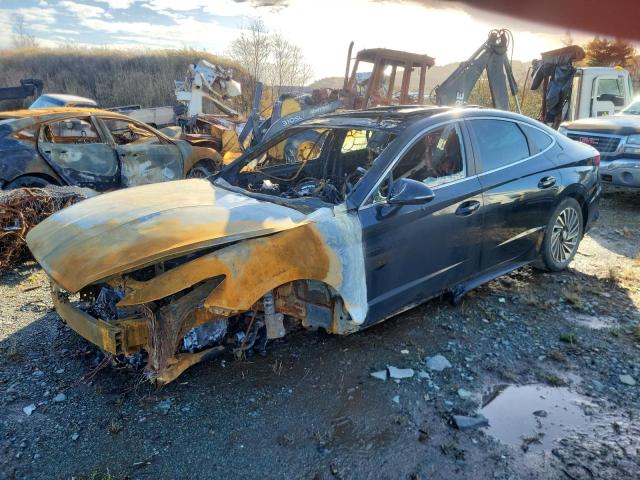 2023 Hyundai Sonata hybrid VIN KMHL34JJ7PA064328 COPART salvage auction — BURN, Ns - Cert Of Reg - Non-Repairable, sold $80 on 2026-07-09 (photo 1)
