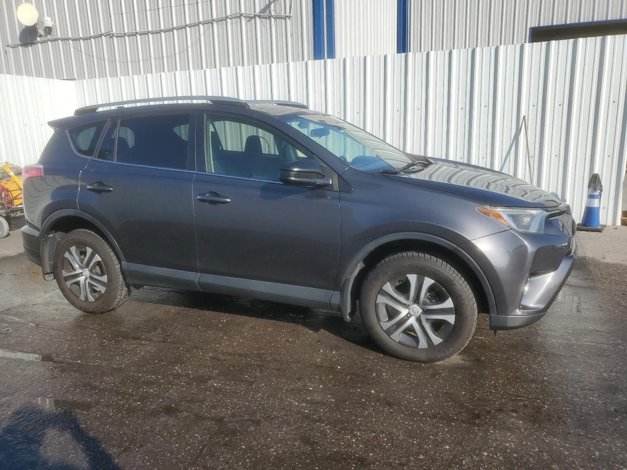2017 Toyota RAV4 VIN JTMBFREV9HJ144376 COPART salvage auction — Normal Wear, IN - CERTIFICATE OF TITLE, sold $10,400 on 2026-07-09 (photo 4)