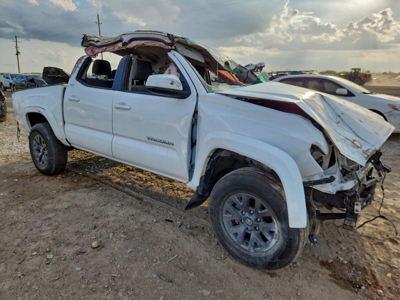2023 Toyota Tacoma VIN 3TMAZ5CN4PM196305 COPART salvage auction — ROLLOVER, TX - SALVAGE VEHICLE TITLE, sold $2,550 on 2026-07-09 (photo 4)