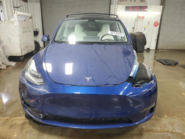 2022 Tesla Model y VIN 7SAYGDEE0NF433940 COPART salvage auction — SIDE, Id - Salvage Certificate Of Title, sold $10,800 on 2026-07-28 (photo 5)
