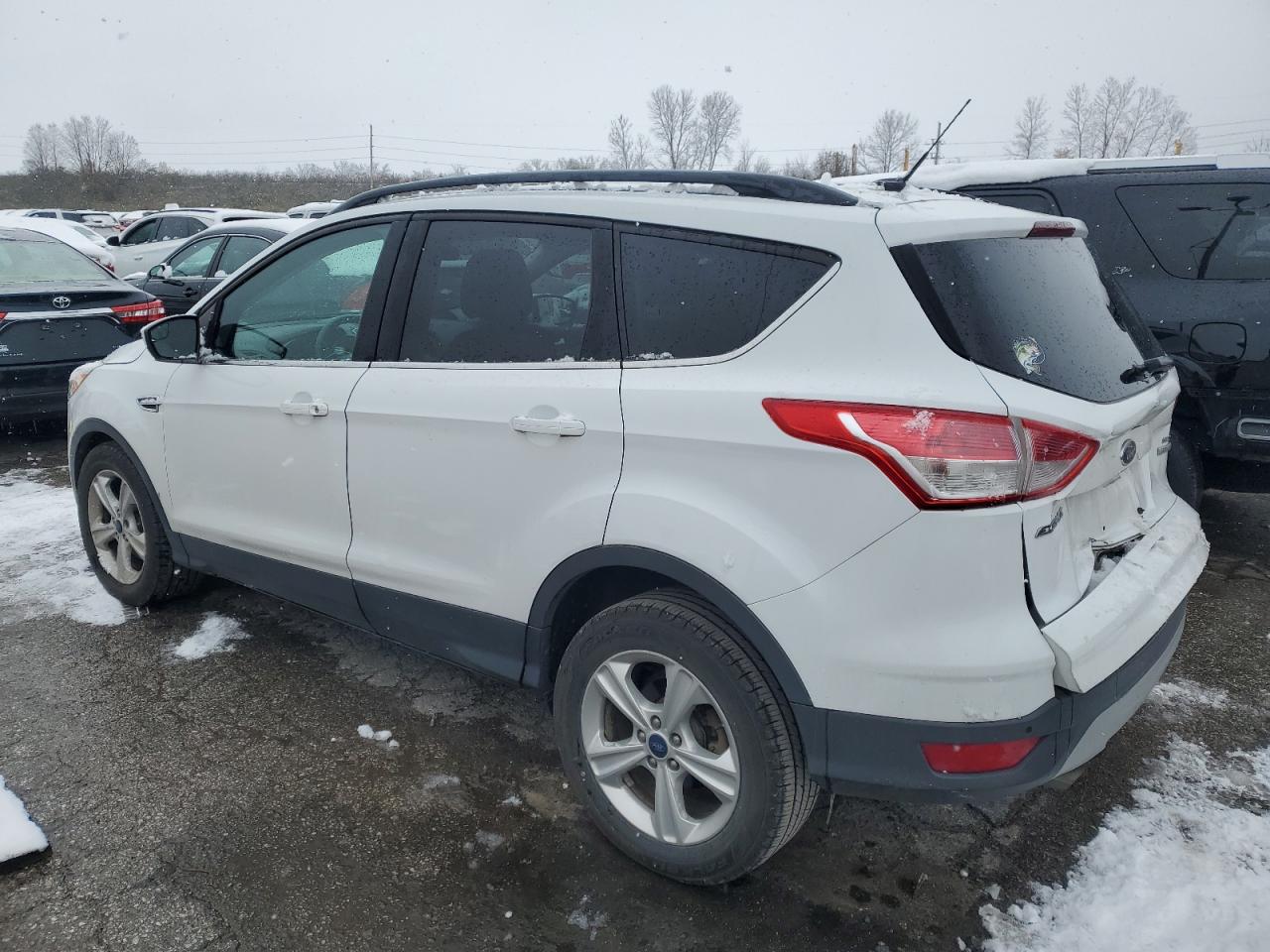 2014 Ford Escape VIN 1FMCU0GX7EUB96888 COPART salvage auction — REAR END, MO - CERTIFICATE OF TITLE, sold $2,500 on 2025-01-17 (photo 2)
