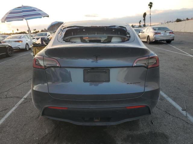 2023 Tesla Model y VIN 7SAYGDEF0PF809287 COPART salvage auction — FRONT END, Ca - Non-Repairable Vehicle Cert, sold $1,800 on 2026-07-31 (photo 6)