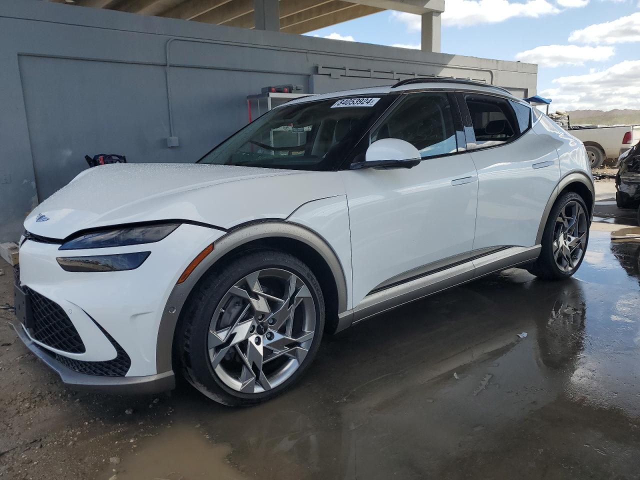2023 Genesis GV60 VIN KMUKEDTB8PU014310 — COPART salvage auction photo