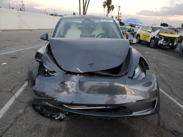 2023 Tesla Model y VIN 7SAYGDEF0PF809287 COPART salvage auction — FRONT END, Ca - Non-Repairable Vehicle Cert, sold $1,800 on 2026-07-31 (photo 5)