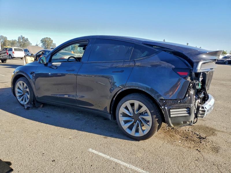 2026 Tesla Model y VIN 7SAYGDEE2TF367761 COPART salvage auction — REAR END, Ca - Salvage Certificate, sold $20,200 on 2026-07-28 (photo 2)