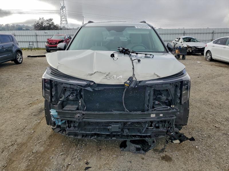 2025 Kia Carnival VIN KNDNE5K38S6467260 COPART salvage auction — FRONT END, Ca - Salvage Certificate, sold $17,200 on 2026-07-06 (photo 5)