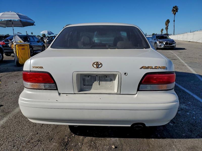 1997 Toyota Avalon VIN 4T1BF12B4VU176816 COPART salvage auction — SIDE, Ca - Salvage Certificate, sold $350 on 2026-07-02 (photo 6)