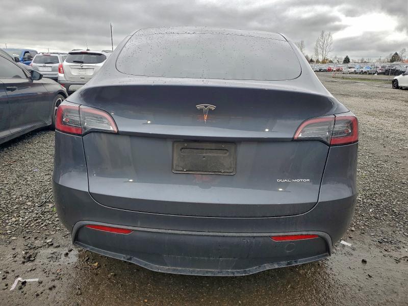 2023 Tesla Model y VIN 7SAYGDEE4PF889801 COPART salvage auction — UNDERCARRIAGE, Or - Salvage Title Certificate, sold $9,800 on 2026-07-21 (photo 6)