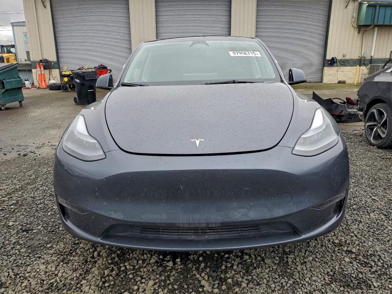 2023 Tesla Model y VIN 7SAYGDEE4PF889801 COPART salvage auction — UNDERCARRIAGE, Or - Salvage Title Certificate, sold $9,800 on 2026-07-21 (photo 5)