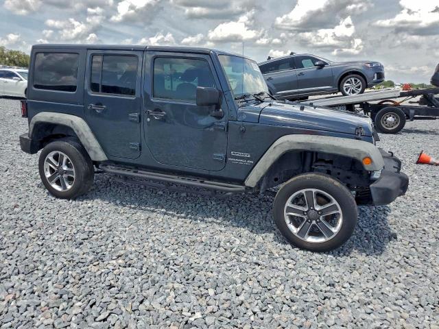 2017 Jeep Wrangler / VIN 1C4BJWDG4HL678163 COPART salvage auction — WATER/FLOOD, Fl - Cert Of Title-Slvg Rebld Flood, sold $6,800 on 2026-07-03 (photo 4)
