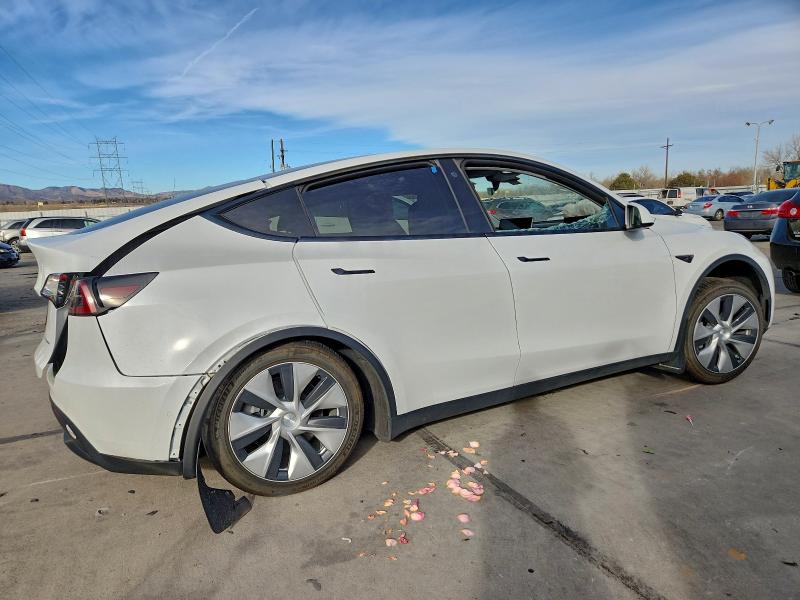 2022 Tesla Model y VIN 7SAYGDEE3NF466611 COPART salvage auction — SIDE, Co - Salvage Title, sold $4,750 on 2026-07-29 (photo 3)