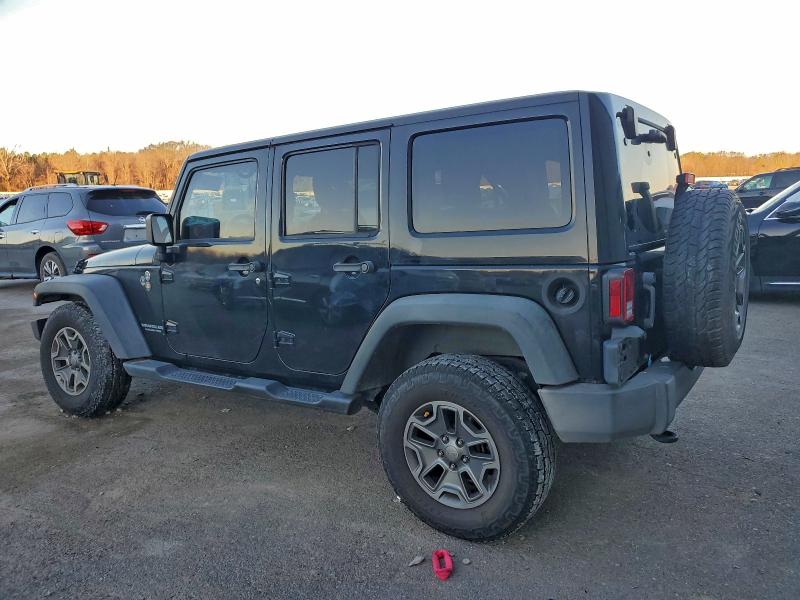 2014 Jeep Wrangler unlimited VIN 1C4BJWFG3EL238377 COPART salvage auction — SIDE, Ar - Certificate Of Title, sold $4,050 on 2026-07-02 (photo 2)