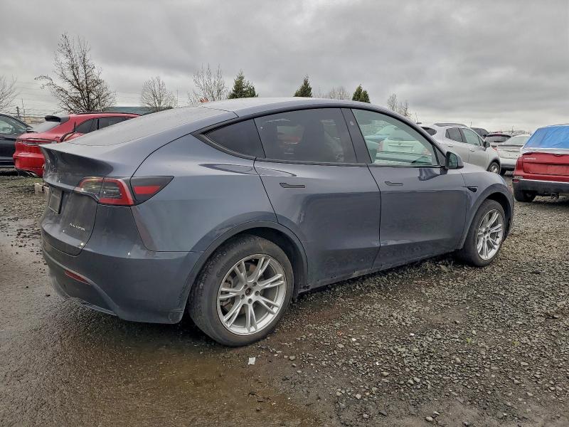 2023 Tesla Model y VIN 7SAYGDEE4PF889801 COPART salvage auction — UNDERCARRIAGE, Or - Salvage Title Certificate, sold $9,800 on 2026-07-21 (photo 3)