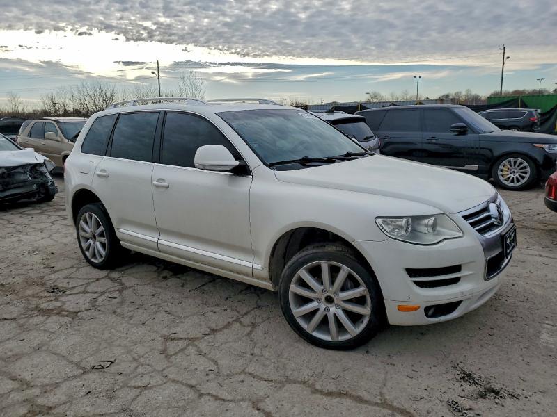 2010 Volkswagen Touareg VIN WVGFK7A93AD002177 COPART salvage auction — SIDE, In - Cert Of Title-Salvage Title, sold $250 on 2026-07-21 (photo 4)