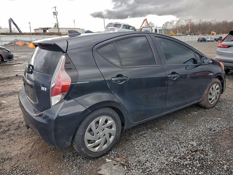 2015 Toyota Prius c VIN JTDKDTB34F1582919 COPART salvage auction — MINOR DENT/SCRATCHES, Nj - Certificate Of Title, sold $375 on 2026-07-28 (photo 3)