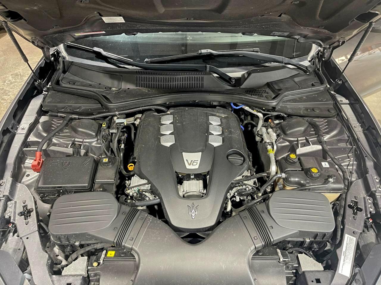 2017 Maserati Ghibli VIN ZAM57XSA9H1206127 COPART salvage auction — Damage History, Tx - Salvage Cert-Manufacturer Buyb (P), sold $33,500 on 2026-01-05 (photo 7)