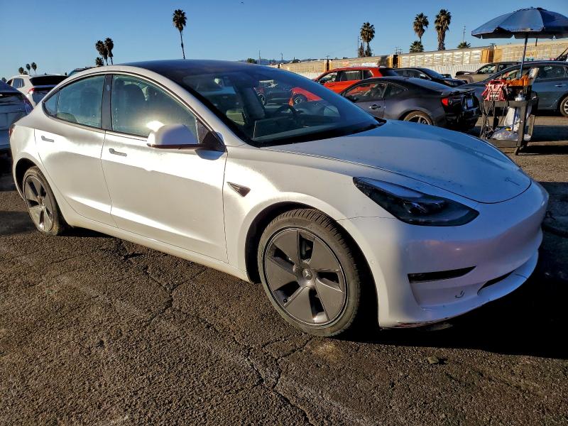 2022 Tesla Model 3 VIN 5YJ3E1EB7NF331553 COPART salvage auction — MECHANICAL, Ca - Salvage Certificate, sold $5,600 on 2026-07-14 (photo 4)