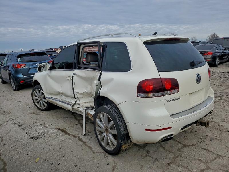 2010 Volkswagen Touareg VIN WVGFK7A93AD002177 COPART salvage auction — SIDE, In - Cert Of Title-Salvage Title, sold $250 on 2026-07-21 (photo 2)