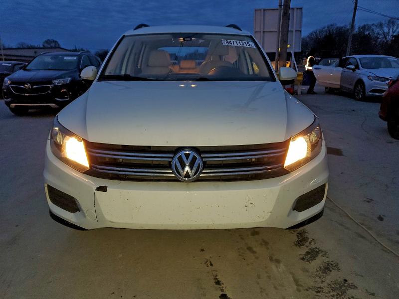 2017 Volkswagen Tiguan VIN WVGAV7AX9HK022794 COPART salvage auction — SIDE, Salvage Title, sold $550 on 2026-08-03 (photo 5)