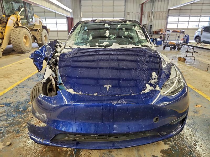 2023 Tesla Model y VIN 7SAYGDEE7PA174508 COPART salvage auction — ALL OVER, Mi - Certificate Of Title, sold $8,200 on 2026-07-06 (photo 5)