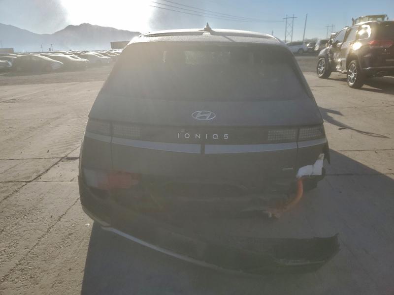 2023 Hyundai Ioniq 5 VIN KM8KNDAF8PU169248 COPART salvage auction — REAR END, Ut - Salvage Certificate, sold $7,600 on 2026-08-03 (photo 6)