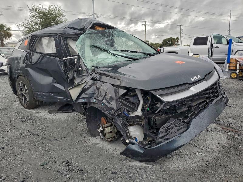 2023 Kia Sportage VIN 5XYK33AF5PG097141 COPART salvage auction — ALL OVER, Fl - Certificate Of Destruction, sold $2,850 on 2026-07-07 (photo 4)