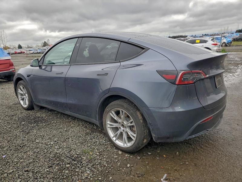 2023 Tesla Model y VIN 7SAYGDEE4PF889801 COPART salvage auction — UNDERCARRIAGE, Or - Salvage Title Certificate, sold $9,800 on 2026-07-21 (photo 2)