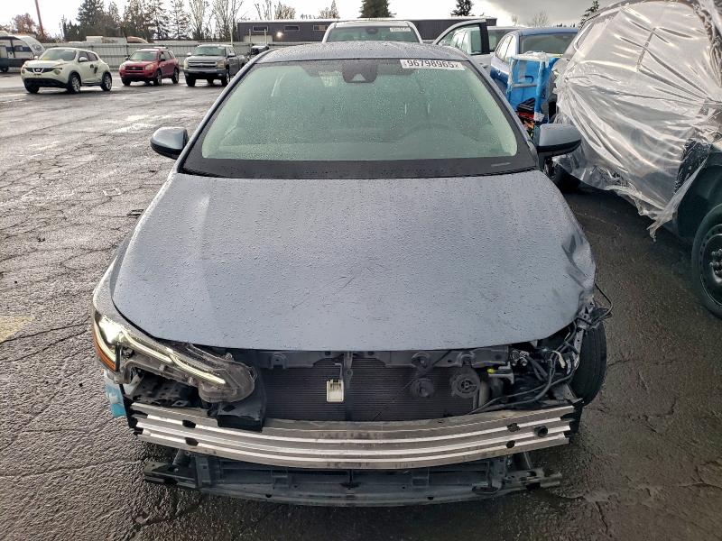 2022 Toyota Corolla VIN JTDEAMDE1NJ039620 COPART salvage auction — FRONT END, OR - SALVAGE TITLE CERTIFICATE, sold $7,600 on 2026-07-13 (photo 5)
