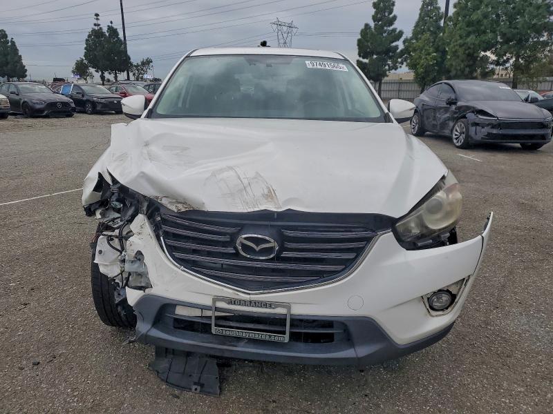 2016 Mazda Cx-5 VIN JM3KE2DY9G0807107 COPART salvage auction — FRONT END, Ca - Salvage Certificate, sold $2,000 on 2026-07-09 (photo 5)
