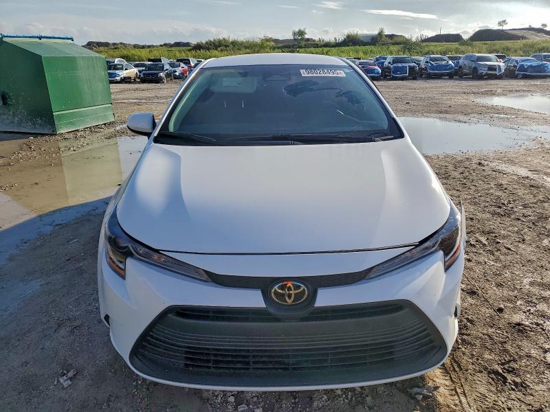 2025 Toyota Corolla VIN 5YFB4MDE4SP288124 COPART salvage auction — SIDE, Other, sold $6,700 on 2026-07-16 (photo 5)