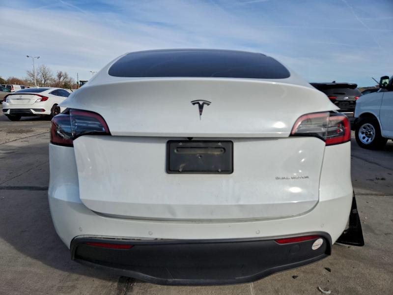 2022 Tesla Model y VIN 7SAYGDEE3NF466611 COPART salvage auction — SIDE, Co - Salvage Title, sold $4,750 on 2026-07-29 (photo 6)