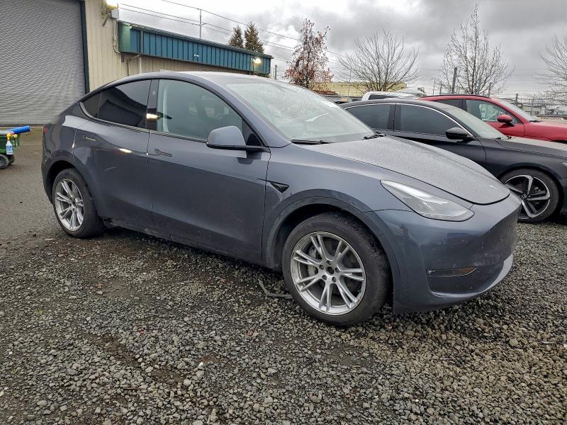2023 Tesla Model y VIN 7SAYGDEE4PF889801 COPART salvage auction — UNDERCARRIAGE, Or - Salvage Title Certificate, sold $9,800 on 2026-07-21 (photo 4)