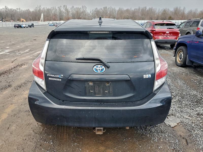 2015 Toyota Prius c VIN JTDKDTB34F1582919 COPART salvage auction — MINOR DENT/SCRATCHES, Nj - Certificate Of Title, sold $375 on 2026-07-28 (photo 6)