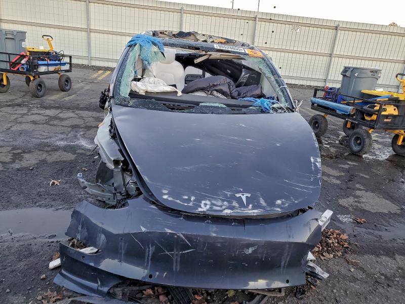 2022 Tesla Model 3 VIN 5YJ3E1EB7NF127173 COPART salvage auction — ALL OVER, VA - CERT OF TITLE - SALVAGE (P), sold $700 on 2026-07-10 (photo 5)