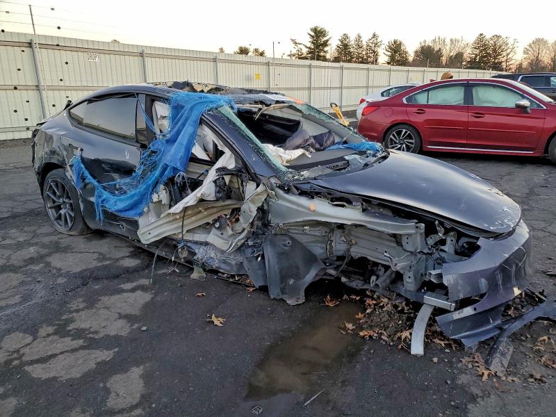 2022 Tesla Model 3 VIN 5YJ3E1EB7NF127173 COPART salvage auction — ALL OVER, VA - CERT OF TITLE - SALVAGE (P), sold $700 on 2026-07-10 (photo 4)
