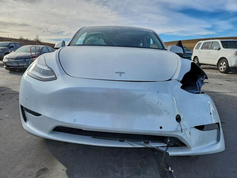 2022 Tesla Model y VIN 7SAYGDEE3NF466611 COPART salvage auction — SIDE, Co - Salvage Title, sold $4,750 on 2026-07-29 (photo 5)