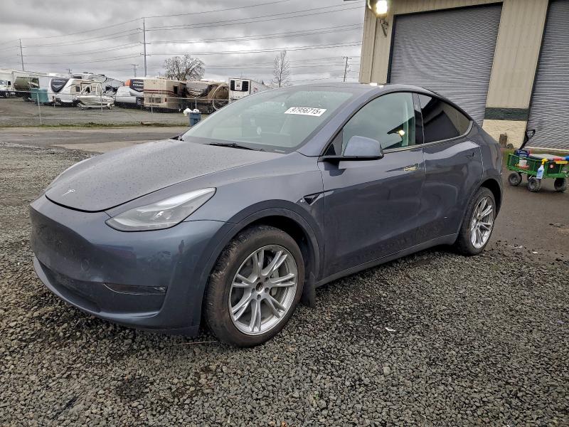 2023 Tesla Model y VIN 7SAYGDEE4PF889801 COPART salvage auction — UNDERCARRIAGE, Or - Salvage Title Certificate, sold $9,800 on 2026-07-21 (photo 1)