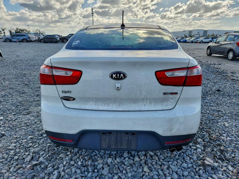 2014 Kia Rio VIN KNADN4A36E6335428 COPART salvage auction — FRONT END, Fl - Cert Of Title Slvg Rebuildable, sold $500 on 2026-07-08 (photo 6)