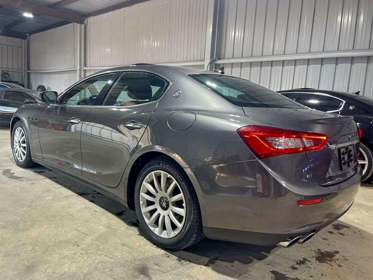 2017 Maserati Ghibli VIN ZAM57XSA9H1206127 COPART salvage auction — Damage History, Tx - Salvage Cert-Manufacturer Buyb (P), sold $33,500 on 2026-01-05 (photo 3)