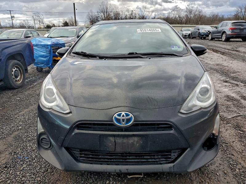 2015 Toyota Prius c VIN JTDKDTB34F1582919 COPART salvage auction — MINOR DENT/SCRATCHES, Nj - Certificate Of Title, sold $375 on 2026-07-28 (photo 5)