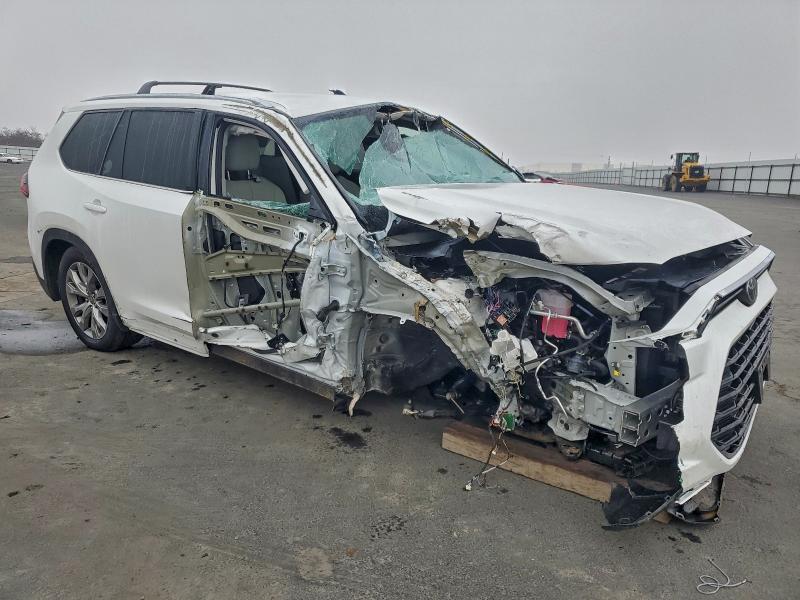 2024 Toyota Highlander VIN 5TDAAAB50RS069250 COPART salvage auction — Rollover, CA - SALVAGE CERTIFICATE, sold $14,100 on 2026-05-21 (photo 4)