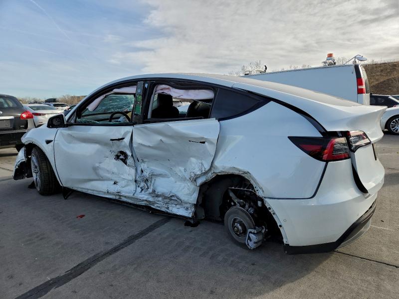 2022 Tesla Model y VIN 7SAYGDEE3NF466611 COPART salvage auction — SIDE, Co - Salvage Title, sold $4,750 on 2026-07-29 (photo 2)