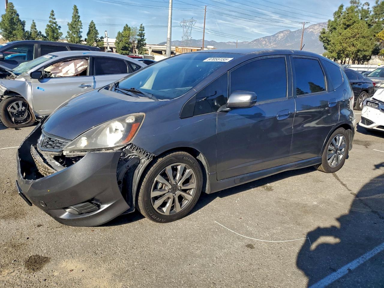 2012 Honda Fit VIN JHMGE8H58CC042044 COPART salvage auction — Front End, CA - SALVAGE CERTIFICATE, sold $3,250 on 2026-02-12 (photo 1)