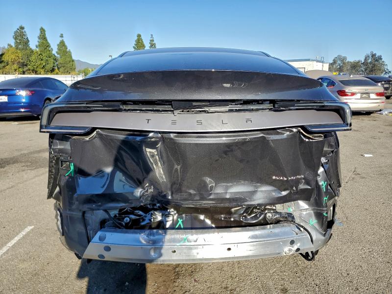 2026 Tesla Model y VIN 7SAYGDEE2TF367761 COPART salvage auction — REAR END, Ca - Salvage Certificate, sold $20,200 on 2026-07-28 (photo 6)