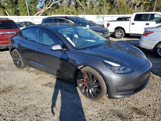 2021 Tesla Model 3 VIN 5YJ3E1EC4MF988608 COPART salvage auction — REAR END, FL - CERT OF TITLE SLVG REBUILDABLE, sold $12,500 on 2025-02-25 (photo 4)