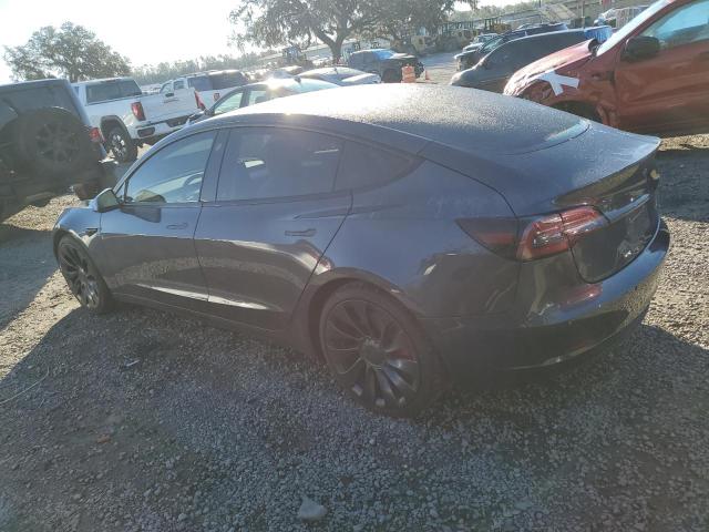 2021 Tesla Model 3 VIN 5YJ3E1EC4MF988608 COPART salvage auction — REAR END, FL - CERT OF TITLE SLVG REBUILDABLE, sold $12,500 on 2025-02-25 (photo 2)