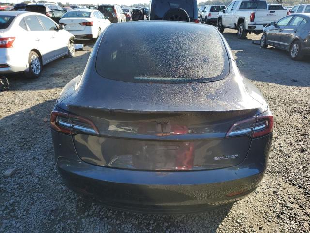 2021 Tesla Model 3 VIN 5YJ3E1EC4MF988608 COPART salvage auction — REAR END, FL - CERT OF TITLE SLVG REBUILDABLE, sold $12,500 on 2025-02-25 (photo 6)