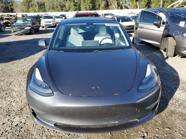 2021 Tesla Model 3 VIN 5YJ3E1EC4MF988608 COPART salvage auction — REAR END, FL - CERT OF TITLE SLVG REBUILDABLE, sold $12,500 on 2025-02-25 (photo 5)