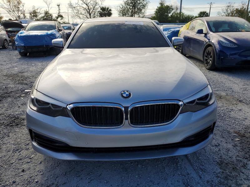 2017 BMW 5 series VIN WBAJA7C38HG903741 COPART salvage auction — MINOR DENT/SCRATCHES, Fl - Certificate Of Title, sold $7,975 on 2026-07-27 (photo 5)